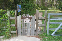 Go through the gate out of the rest area and onto the trail.