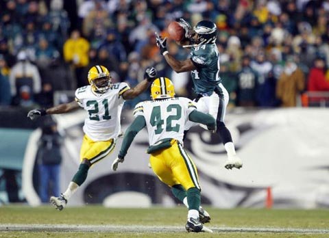 Freddie Mitchell catches an improbable 28-yard pass on 4th and 26 to save the Eagles season in the 2003 playoffs.