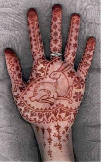 Mehndi designs on left hand palms