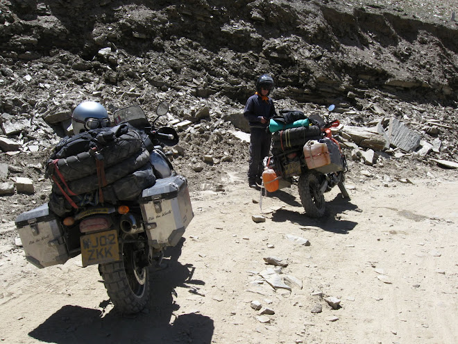 Tony dropped the KTM on loose surface.