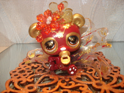 Petshop: Panda rouge foncé et or