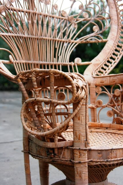 Close up of the detail on a vintage wicker peacock chair