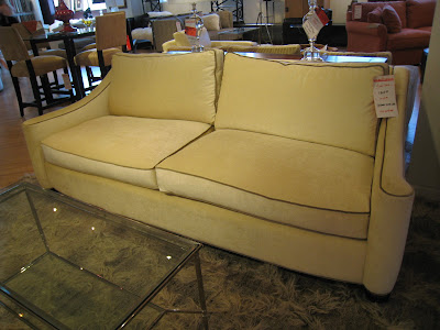 Cream colored sofa with piping at HD Buttercup