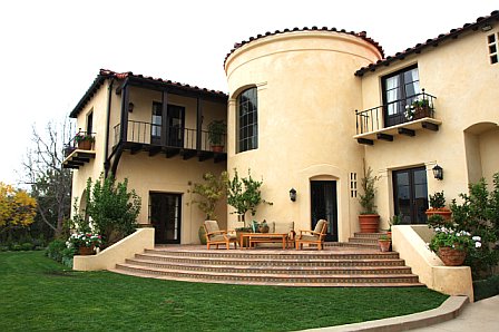 Front entry gets turned into a back patio after remodeling with a view of a lush backyard