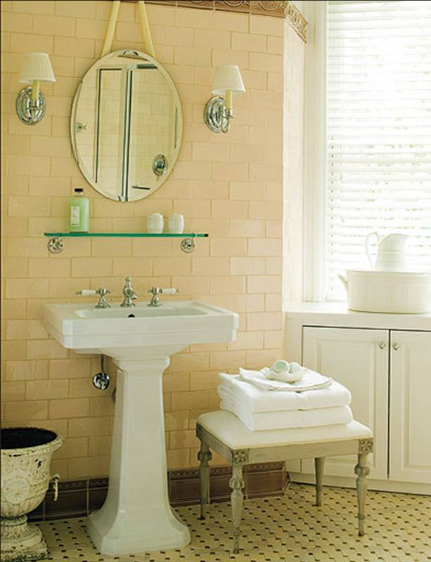 Black And White Tile Bathroom. A white pedestal sink is