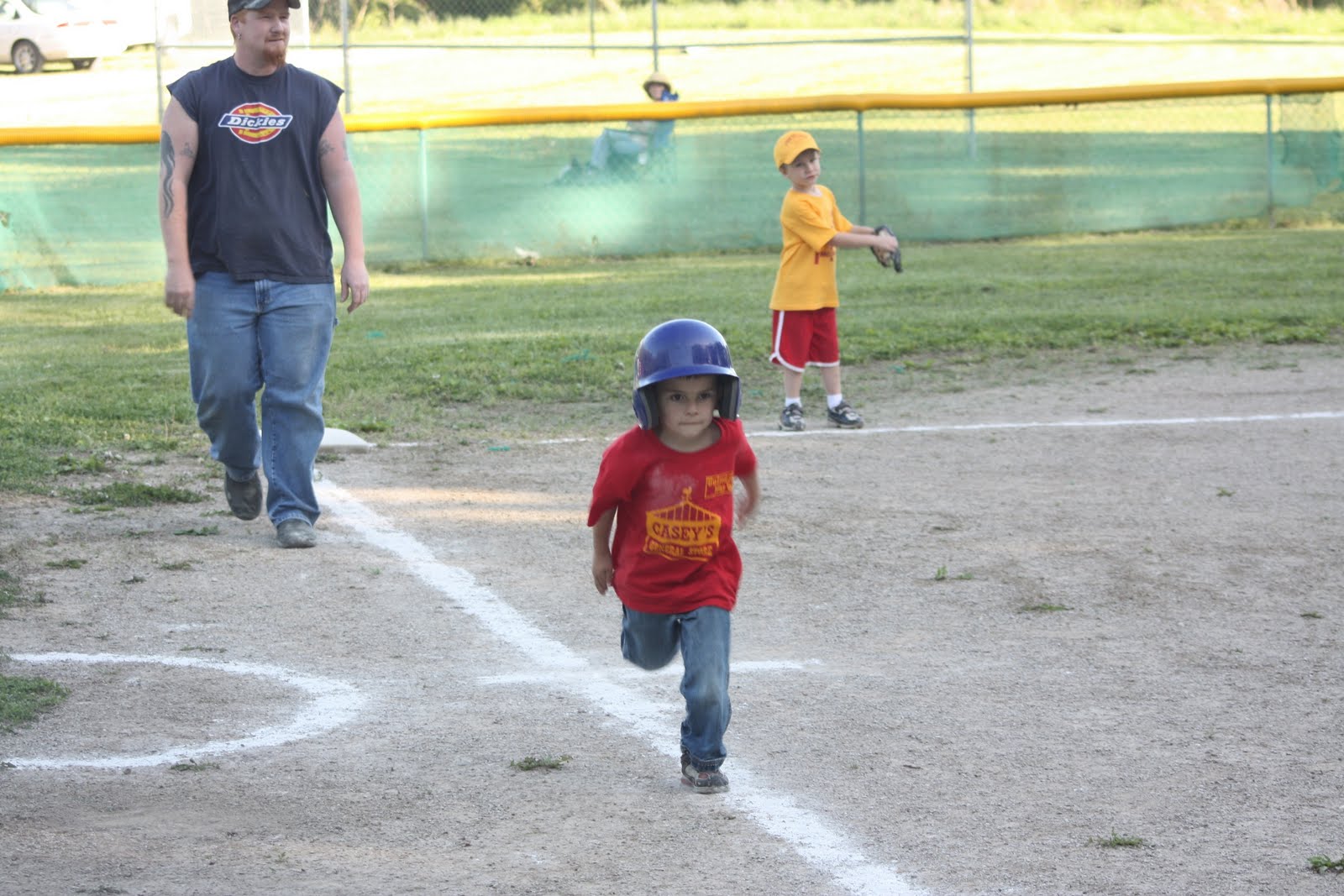 Barefoot outside Tball kids.