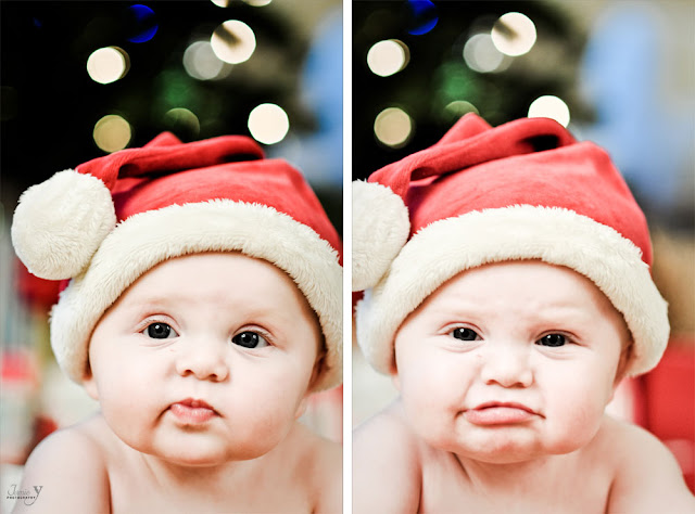 A baby girl wearing a santa hat during a las vegas photo shoot making funny faces.