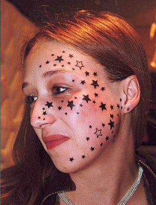 Girl With Stars Face Tattoo