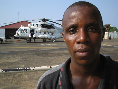 [Silas-Siakor-at-the-UN-airp.jpg]
