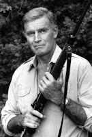 Actor Charles Heston displays one of his rifles at his home in Los Angeles, Calif, in September 1984. Heston, who won the 1959 best actor Oscar as the chariot-racing 'Ben-Hur' and portrayed Moses, Michelangelo, El Cid and other heroic figures in movie epics of the 50s and 60s, died Saturday April 5, 2008 according to a statement from the actor's family. He was 84. AP Photo/Lennox McClendon.