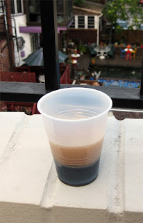 Drinking on a roof deck is worth the heat. Drinking on a roof deck is worth the heat.