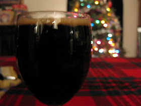 Stout foreground on a Christmas tree background.