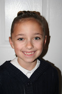 Portrait view of young girl's modeling "Best Three-Leaf Clover" hairstyle