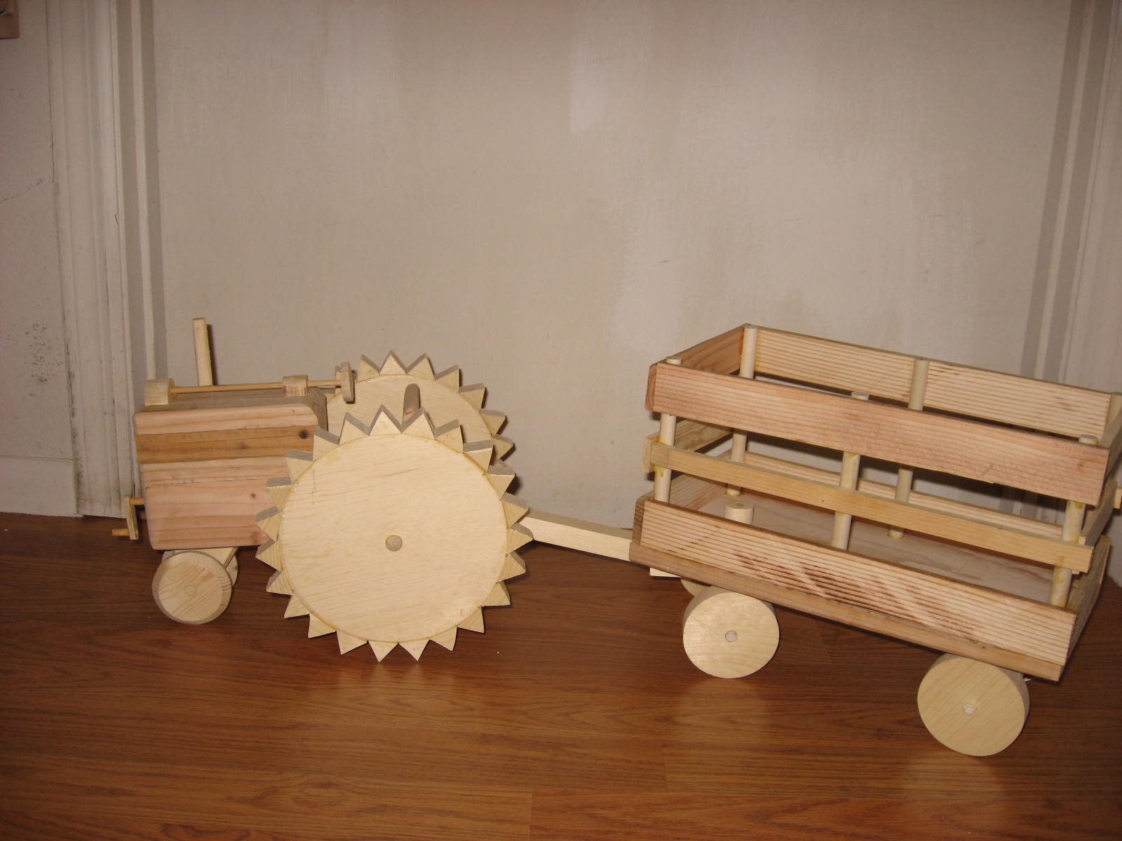 sawdustbybillyo: Wooden tractor with steel wheels with lugs and hay trailer