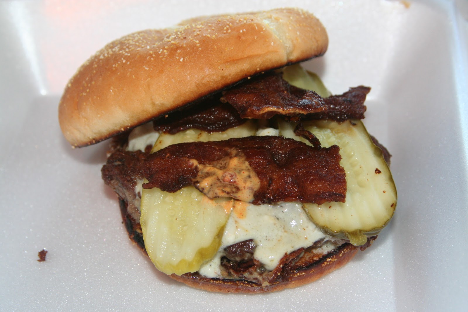BIG GUY SHARING FOOD KILLER BURGER 47TH and Sandy