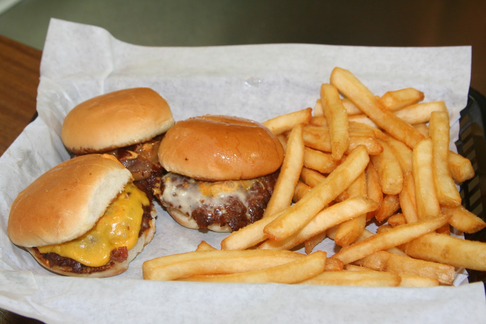 BIG GUY SHARING FOOD KILLER BURGER 47TH and Sandy
