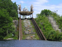 The four sets of tracks keep the boat level as it descends
