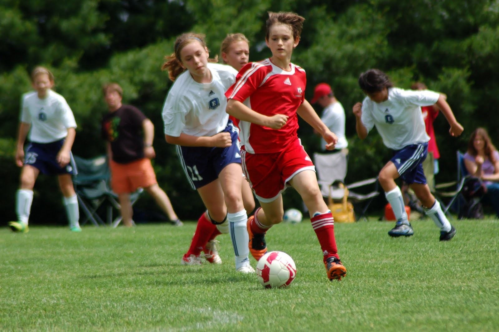 Hectichousehold Action shots of Lexi playing at a recent soccer tournament