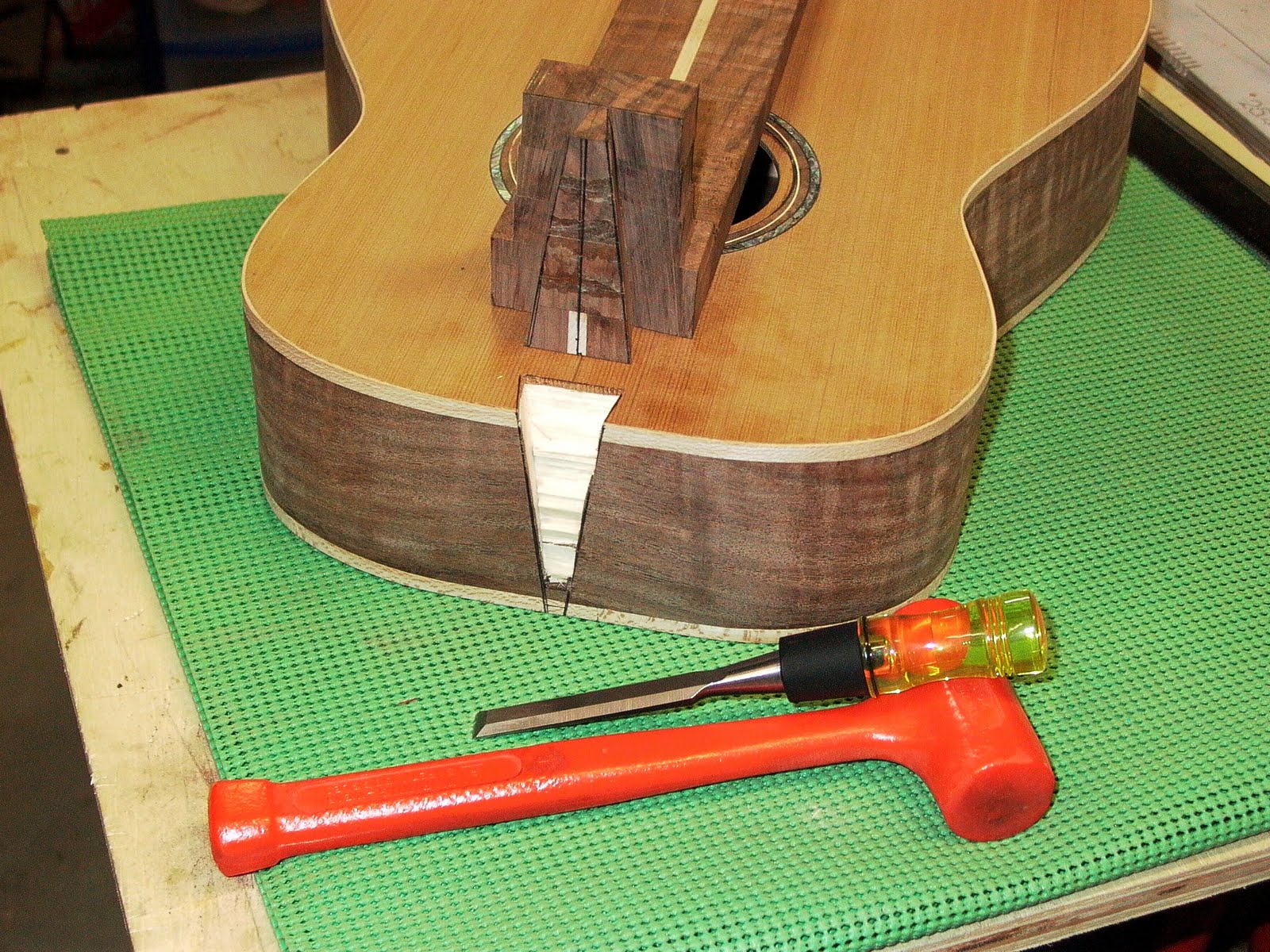 ThreeQuartersLeft Dovetail neck to body joint on an acoustic guitar
