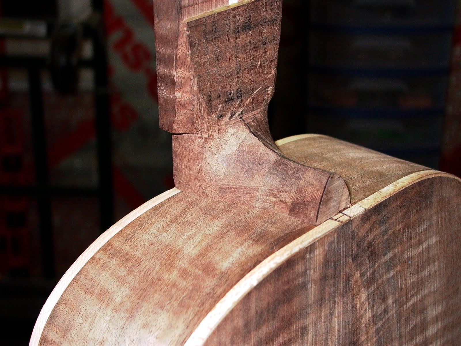 ThreeQuartersLeft Fitting the neck onto an acoustic guitar