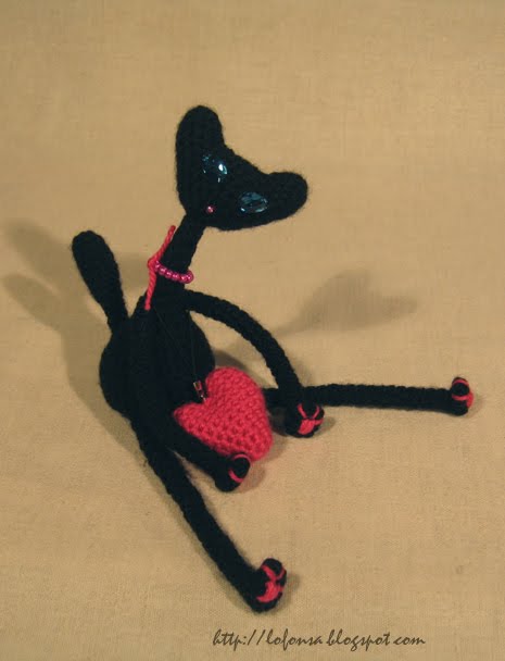 tamborēts melns kaķis,sliņkais kaķis,mīlnieks,lofonsa