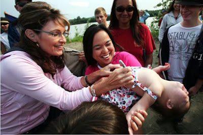 Sarah Palin signing a dead baby