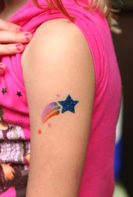 picture of arm shooting star tattoo 