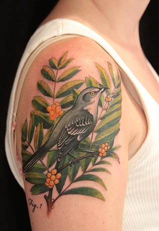 The gaze of the bird is to reach the zenith. The tattoo is not only looking 