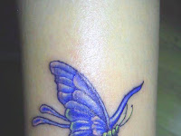 Blue Butterfly Tattoo On Wrist