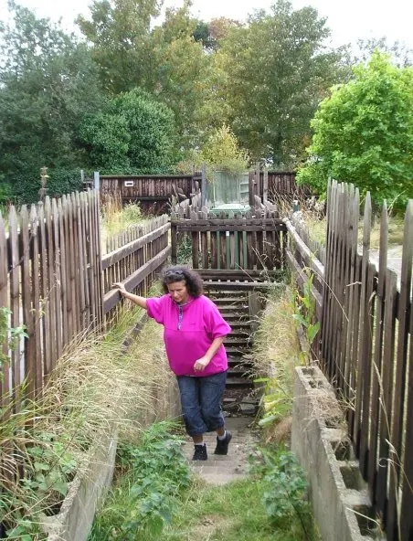 Sutton Corn Mill with the intruiging underpass at its side