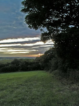 The start and end of the walk - on the left is the start, climbing up to Ivinghoe Beacon, and on the right ,looking for a place to wild camp as the sun goes down.