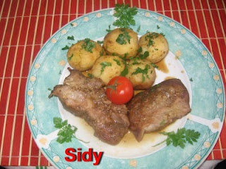 Friptura de porc cu vin si cu ierburi aromate