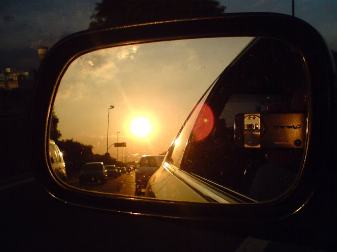 Pôr do Sol através do espelho retrovisor, na Marginal Tietê