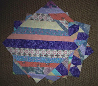 pile of Heartstrings quilts blocks