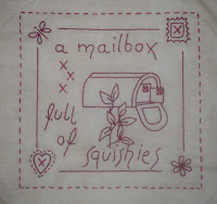 June stitchery block with a mailbox