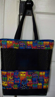 black tote bag with cat fabric pockets and trim