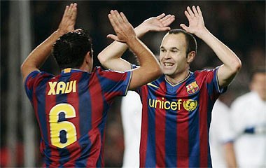 [andres+iniesta+xavi+hernandez+barcelona.jpg]