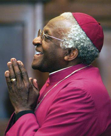 DESMOND TUTU YIELDS THE STAGE.