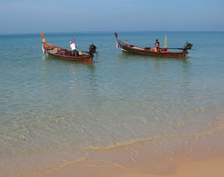 Longtail boats off Karon Beach