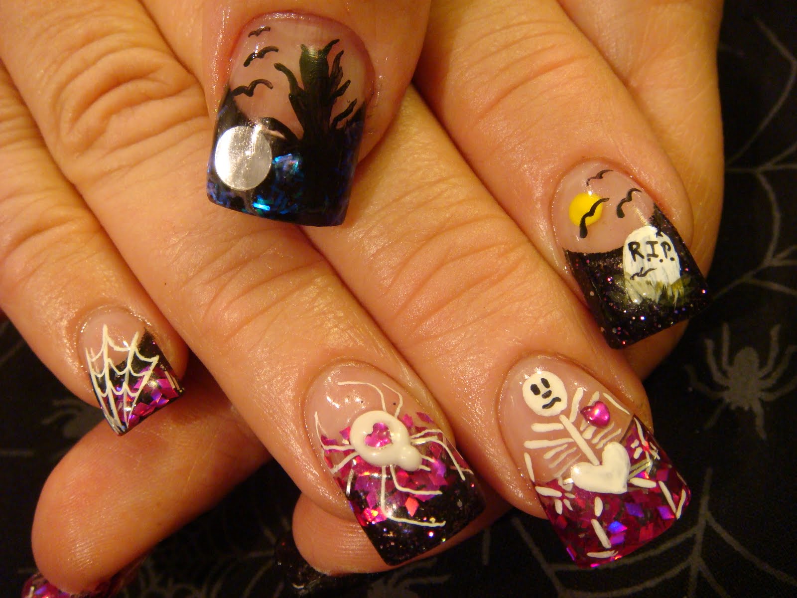 6. Halloween Nail Art with Rhinestone Accents - wide 7