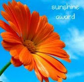 Sunshine Award from Lois @ NAILYORKCITY.