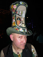 MUSEUM OF BRITSH FOLKLORE: SIMON COSTIN IN LAUNCH PARTY HAT BY STEPHEN JONES