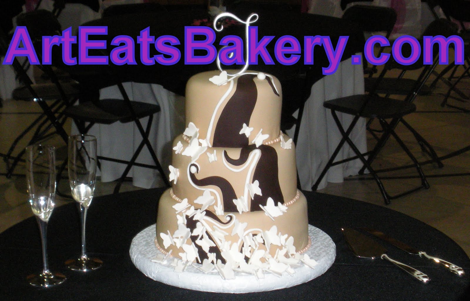 [Butterflies+and+chocolate+swirls+fondant+wedding+cake.jpg]