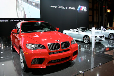 BMW X6 M red side view