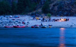 Camping by the river during an Idaho white water rafting trip