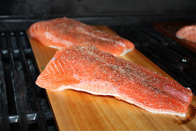 Grilling salmon on cedar planks