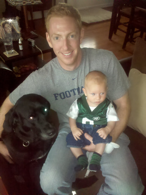 Dave watching Sunday Football with his two children, Tyler and Stella