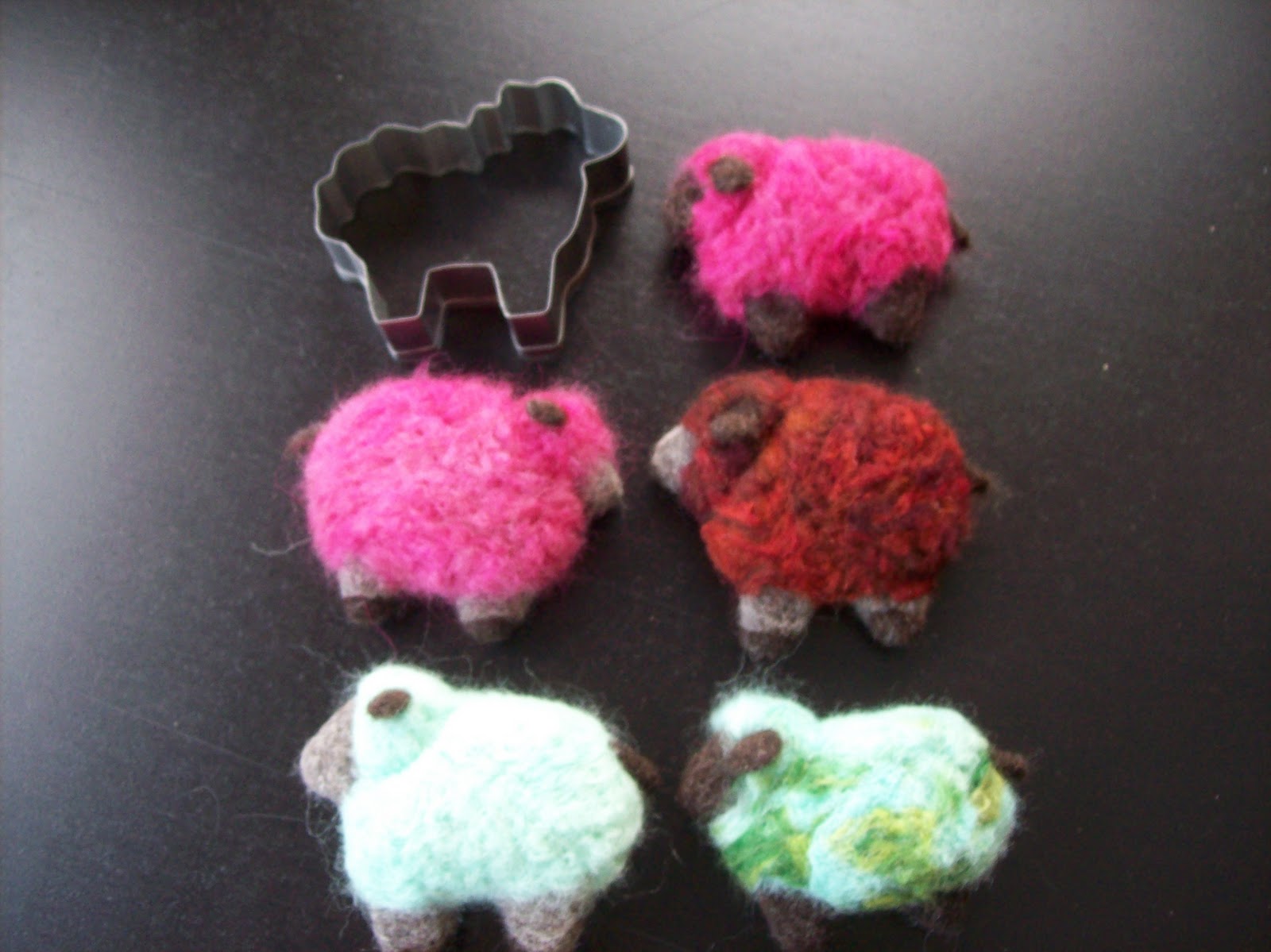 Eyes Of Time Needle felt jewelry, wet felt scarves....felting for the