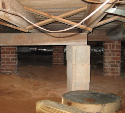 Old support beam under the dining room.