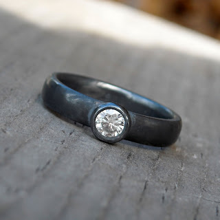 black moissanite ring